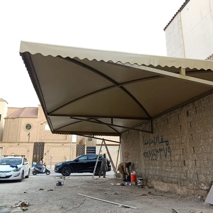 تركيب مظلات سيارات مقص ومداخل المنازل حي العروبه بالرياض 