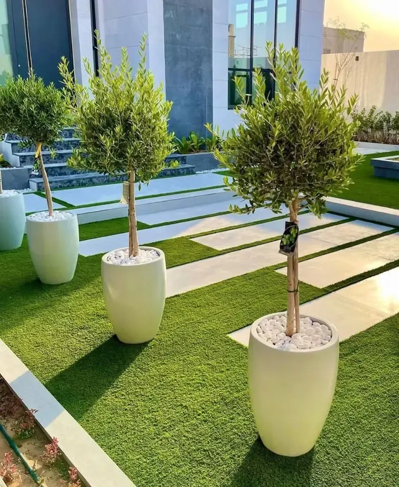 تركيب عشب صناعي لتنسيق حدائق حي التخصصي بالرياض 