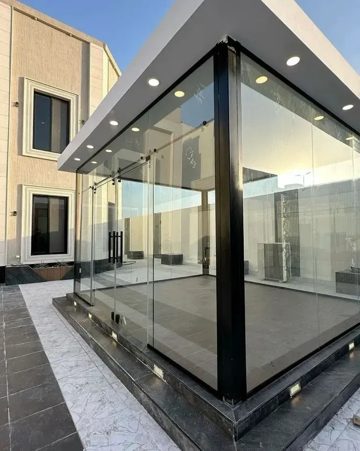 ارخص مقاول بناء مجلس خارجي في حي الياسمين بالحوش انيق زجاجي 