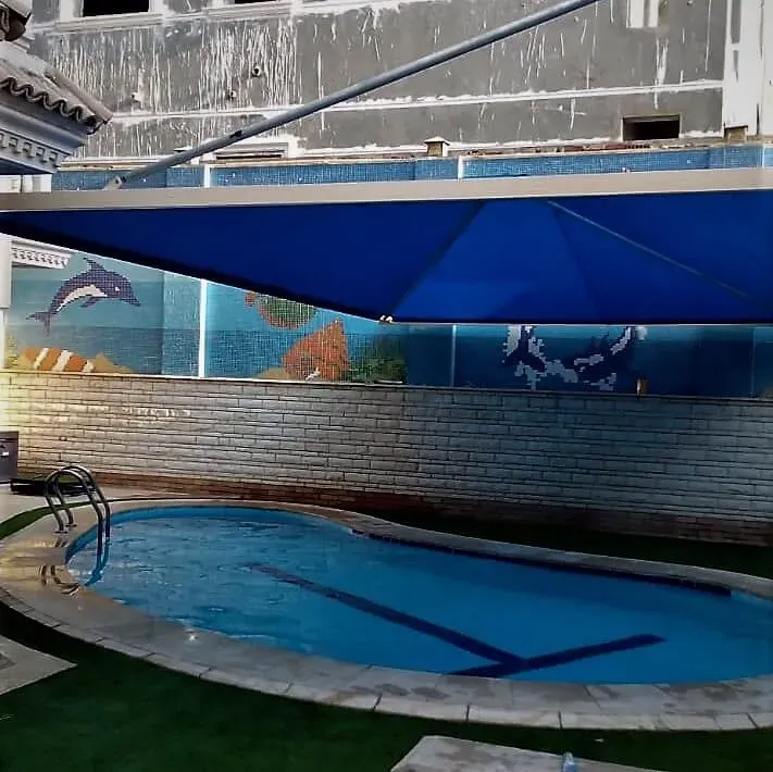 مظلات تغطية مسابح شمال الرياض – حماية كاملة من الشمس والغبار